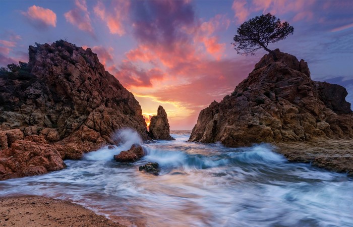 Costa Brava Spain Coastline at Sunset with Crashing Waves