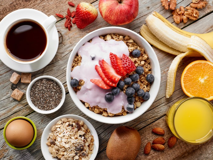 Healthy Breakfast with Coffee, Juice, and Fruits