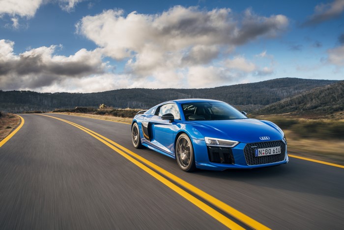Blue Audi R8 Driving on a Mountain Road