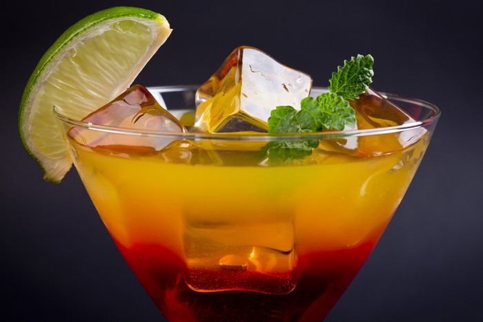 Cocktail with lime and mint in a martini glass