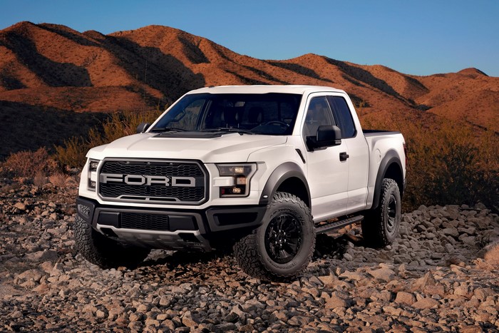 White Ford F-150 Raptor in Desert Landscape