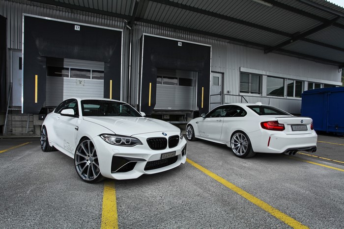 Two white dAHLer M2 F87 Coupe BMWs