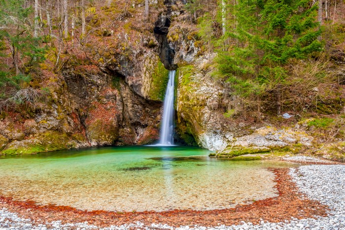 Waterfall in a forest in Slovenia