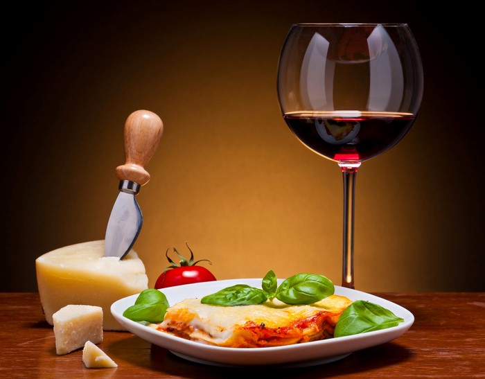 Lasagne with cheese, tomato, basil, and red wine