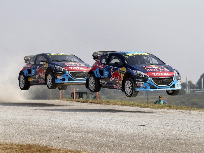 Two Peugeot 208 WRX cars jumping