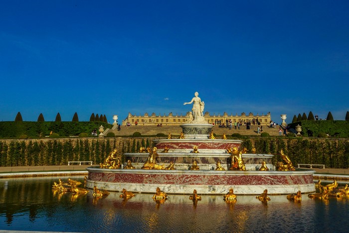 Fountain and Palace of Versailles Gardens, France