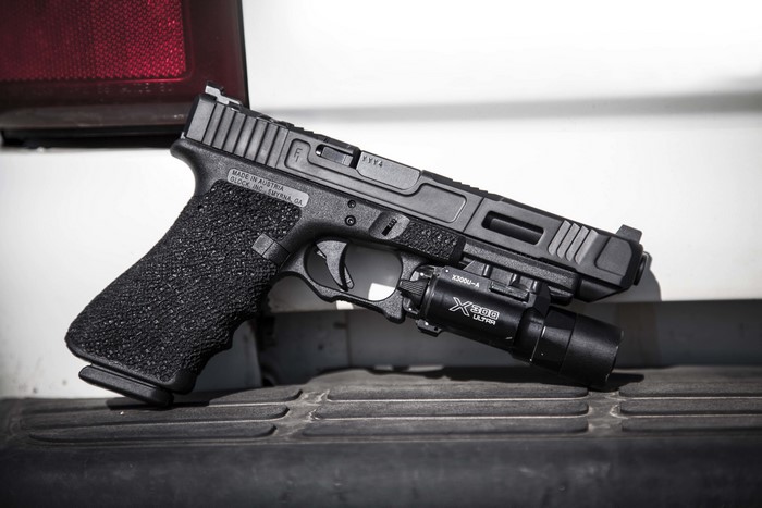 Glock 34 pistol with X300 Ultra light
