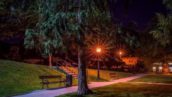 Park at night with benches and street lights in Croatia