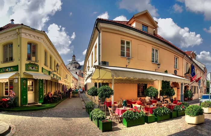 Street scene in Vilnius, Lithuania with outdoor cafes
