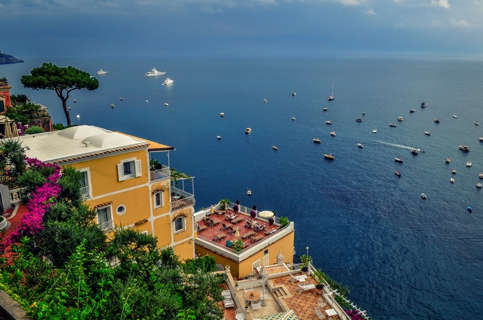Houses on the Amalfi Coast with boats in the sea