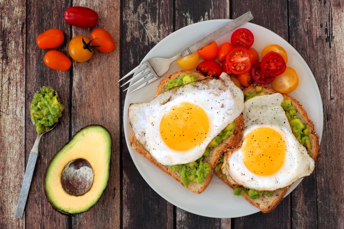 Avocado Toast with Fried Eggs and Tomatoes