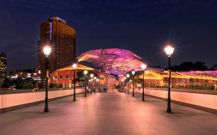 Singapore street at night with Novotel hotel