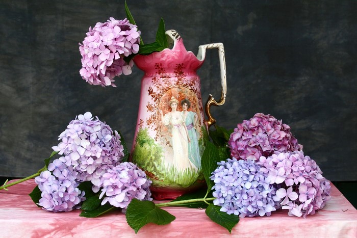 Pink vase with hydrangeas and painted figures