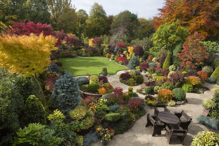 Autumn garden with a lawn and seating area in Walsall, England