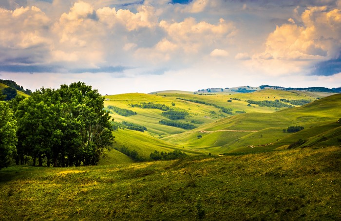 4K Romania Grasslands Scenery with Clouds