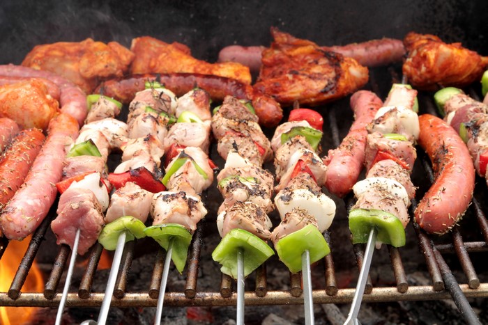 Meat products and sausages on a grill