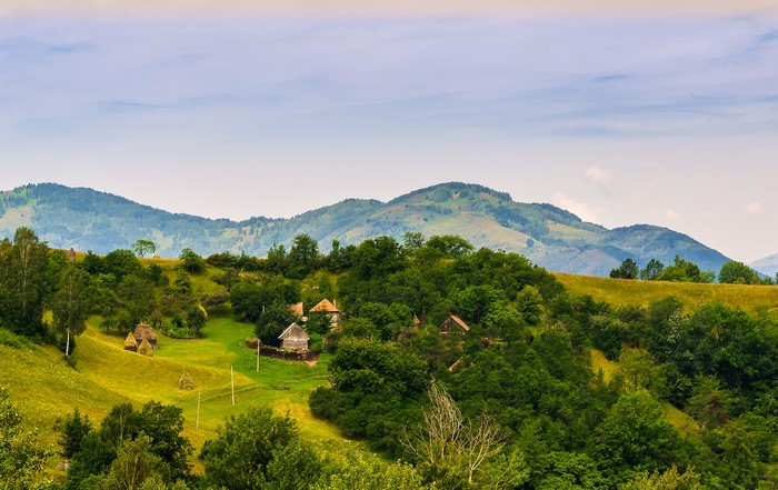 Rural village nestled in Romanian mountains