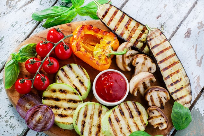 Grilled vegetables and mushrooms with ketchup