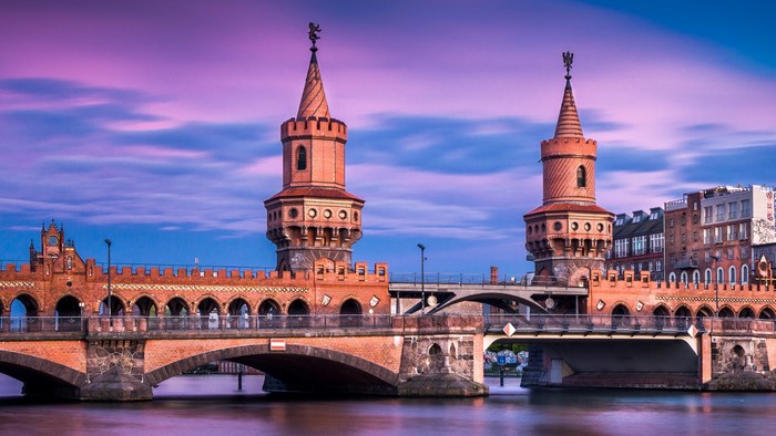 Oberbaum Bridge over Spree River in Berlin at Dusk