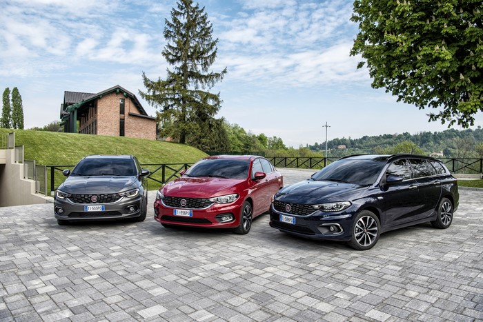 Three Fiat Tipo cars parked on a paved area