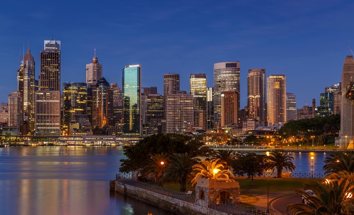 Sydney skyline at night with harbor