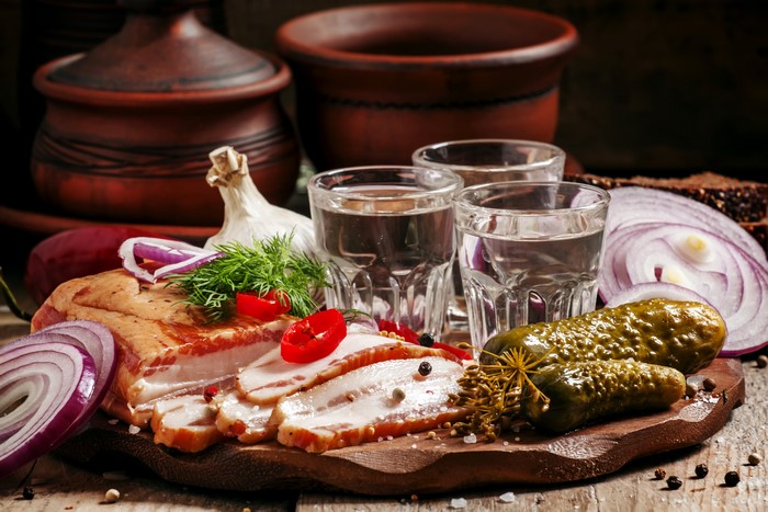 Still-life with Vodka, Salo, Cucumbers, and Onion