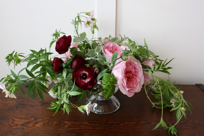 Ranunculus and roses floral arrangement