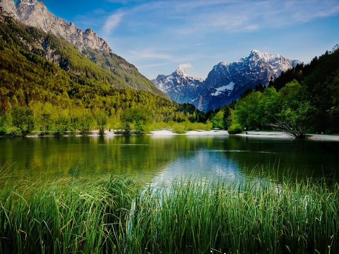 Lake Jasna with Mountains and Green Grass, Slovenia