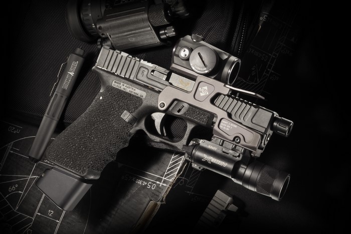 Custom Glock pistol with accessories