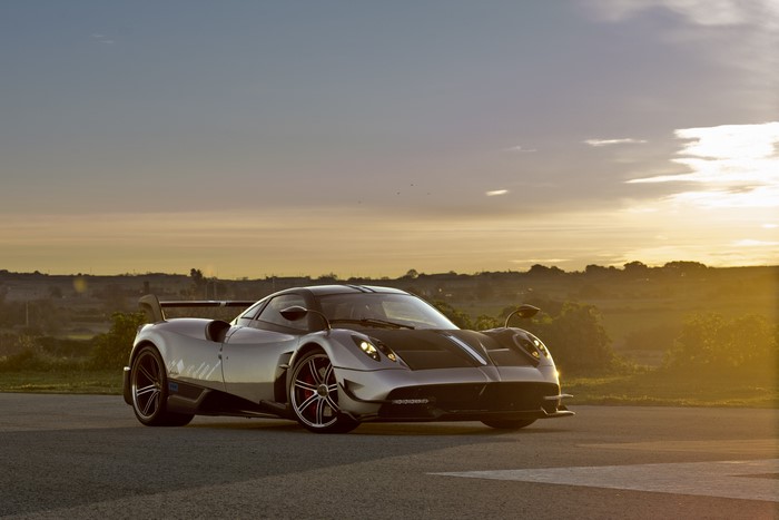 4K Pagani Huayra on a road at sunset