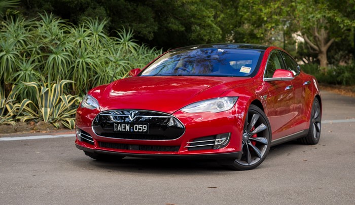 Red Tesla Model S P85D parked outdoors