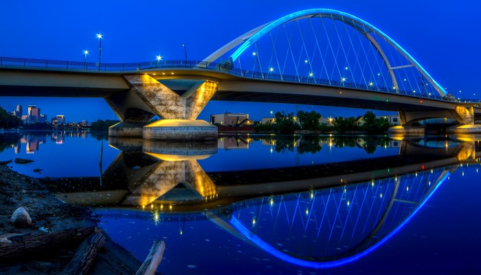 Bridge over river at night in Minneapolis, Minnesota