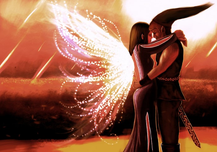 Couple embracing with glowing wings