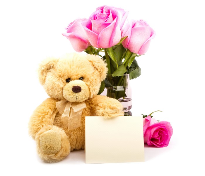Teddy bear with pink roses and blank card
