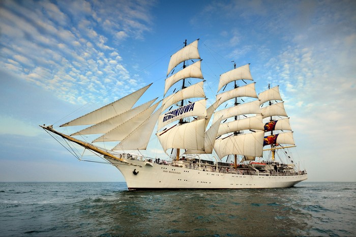 Tall Ship Dar Mlodziezy sailing on the sea