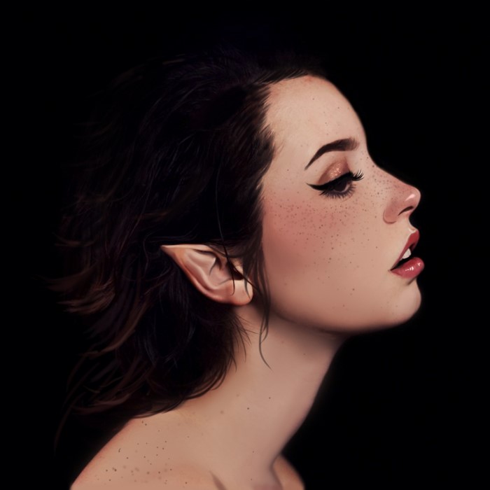 Elf woman with pointed ears and freckles