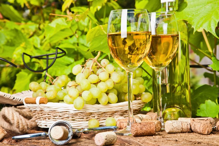 White Wine with Grapes and Corkscrew