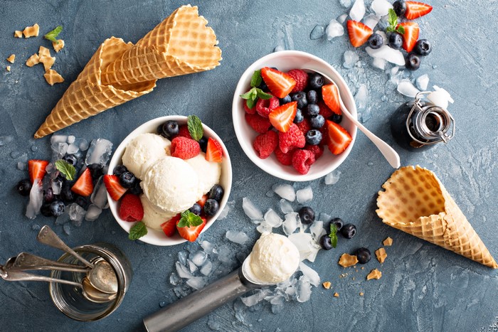 Ice cream with berries and waffle cones