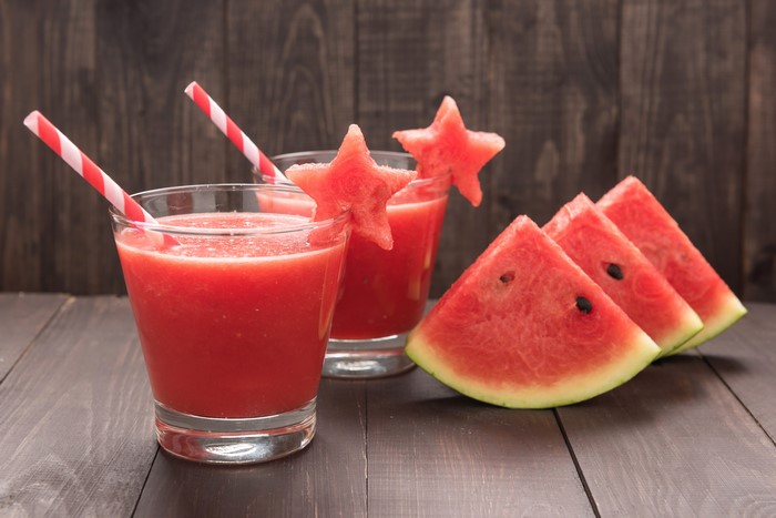 Watermelon juice in glasses with watermelon slices