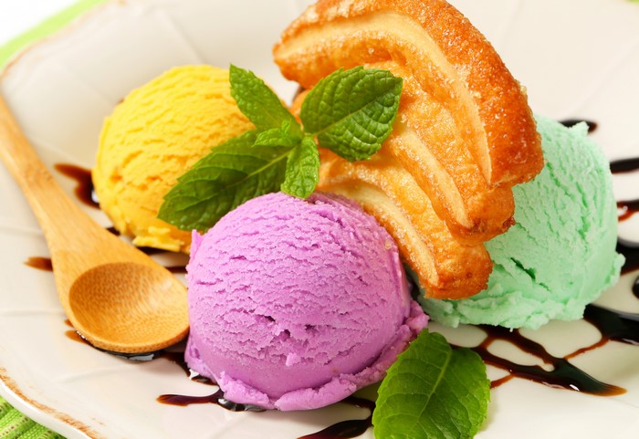 Ice cream scoops with pastry and mint