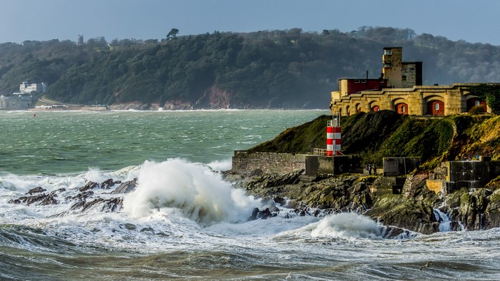 Fort Bovisand, United Kingdom, with lighthouse and waves