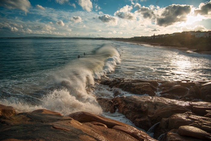 Waves crashing on rocks at Knights Beach Port Elliot, Australia
