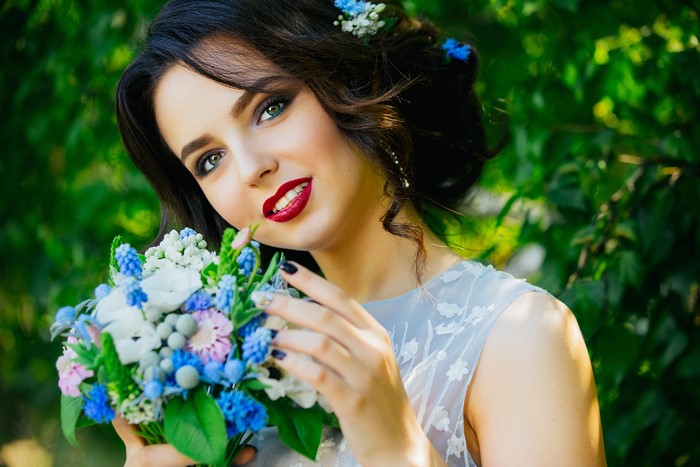Brunette girl with bouquet