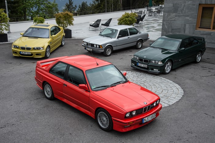 Four BMW M3 cars from different generations