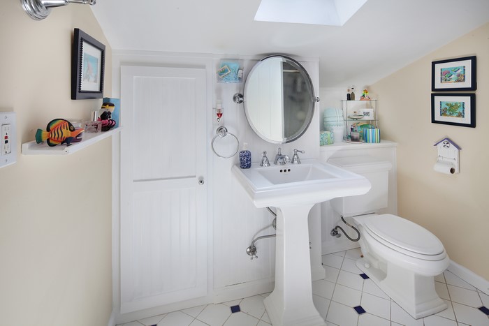 Bathroom with Pedestal Sink and Toilet