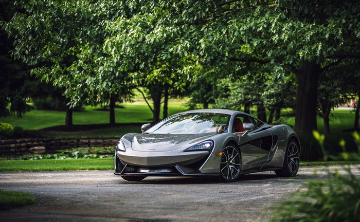 Grey McLaren 570S Coupe on a Road