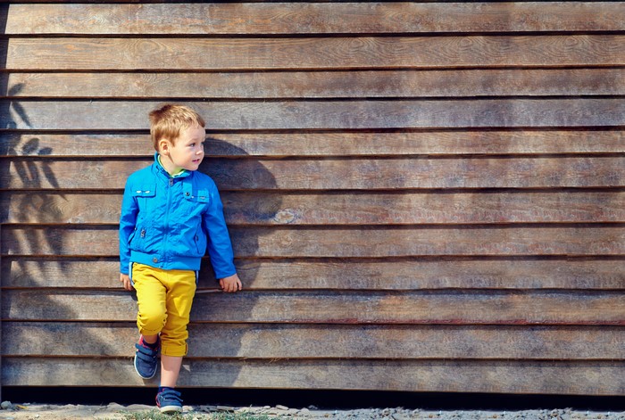 Boy in Blue Jacket and Yellow Pants