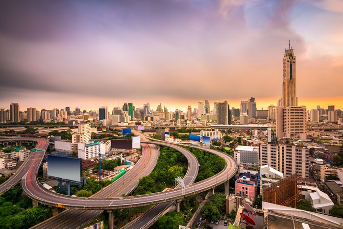 Bangkok, Thailand Skyscrapers and Highway Interchange at Sunset