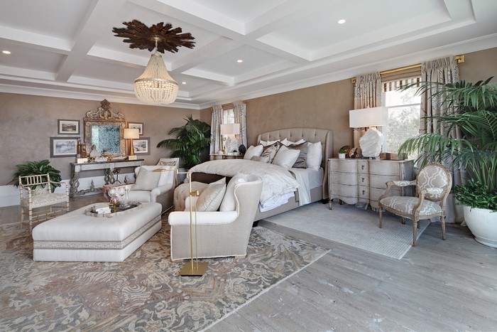 Luxury Bedroom with Chandelier and Armchair