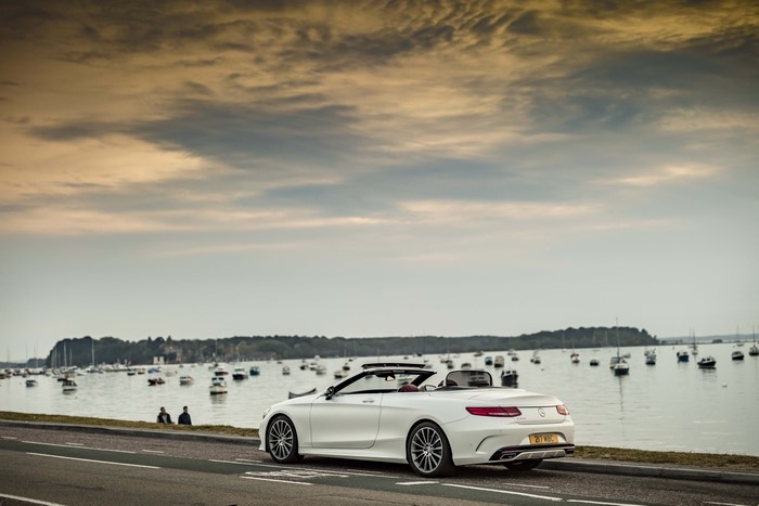 White Mercedes-Benz S 500 Cabriolet AMG line by the water